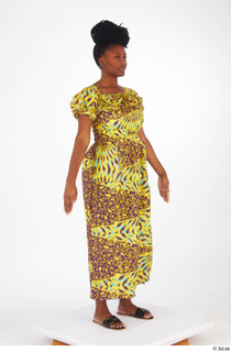 Dina Moses dressed standing whole body yellow long decora apparel…